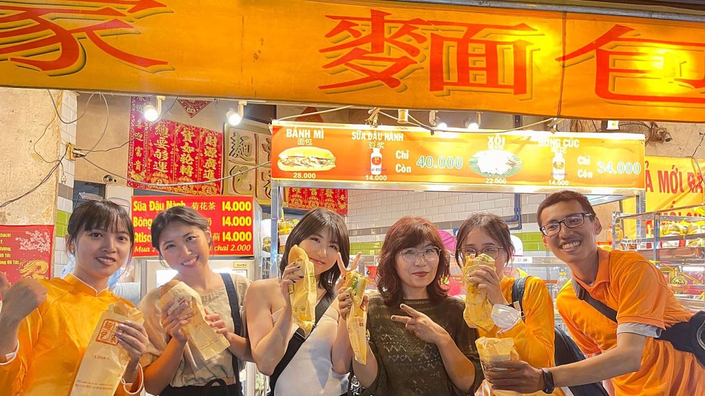 Ao Dai Female Rider Night Food Tour with Optional Seafood BBQ photo 1