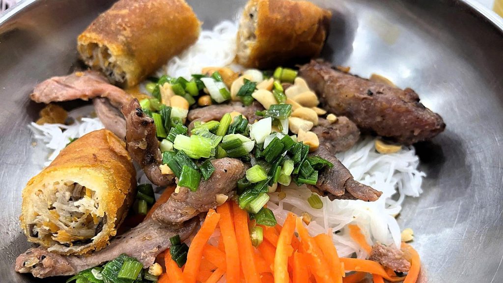 Saigon Daytime Street Food Tour by Motorbike photo 1