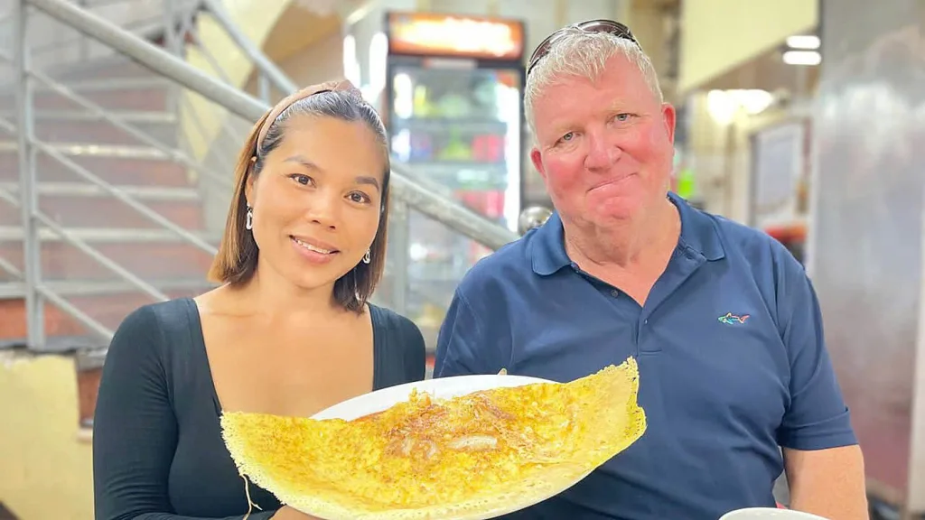 Iconic Saigon By Night Foodie Tour on Motorbike photo 3