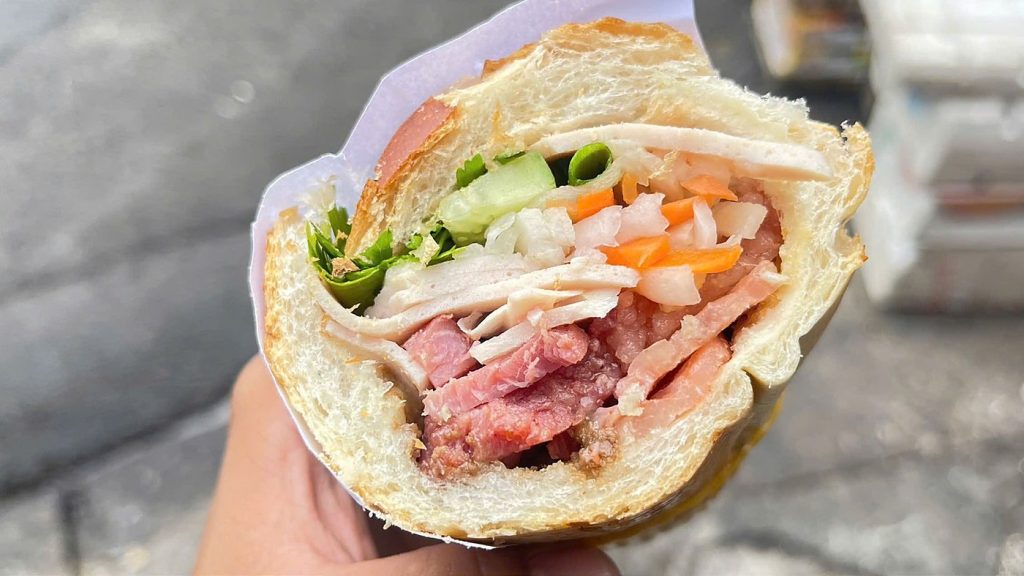 Must-Try Saigon Iconic Food Adventure on Motorbike photo 3